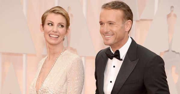 Tim McGraw and Faith Hill on red carpet_Photo tweeted by Pop Sugar.jpg